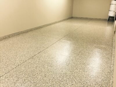 One Car Garage With Taupe Epoxy Floor and Complimenting Granules